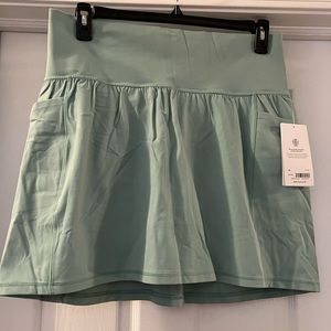 NWT Athleta Salutation Stash Pocket 14.5” Skort. Raleigh Green. Size 1X.